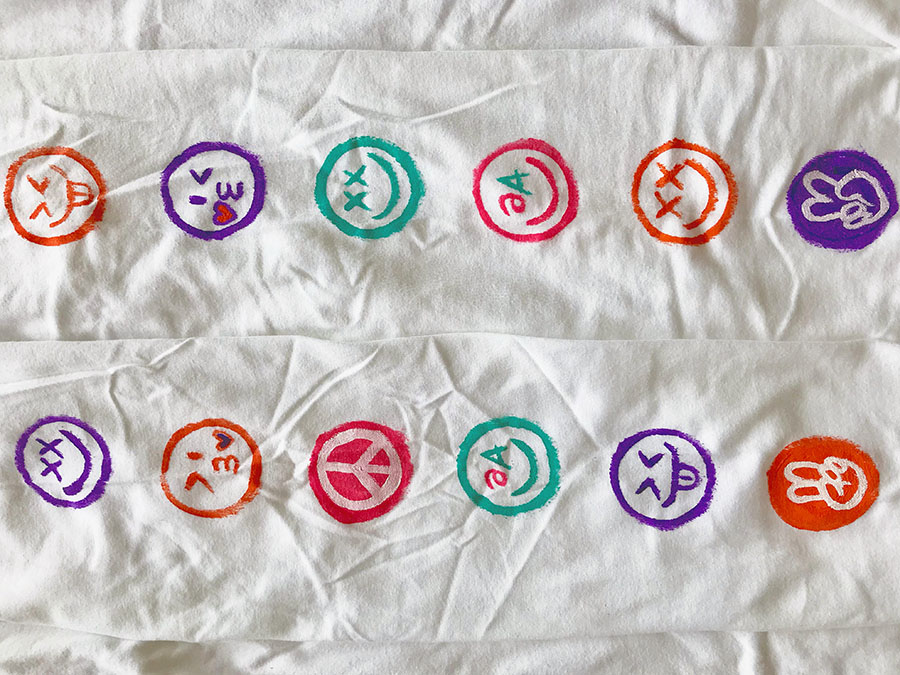 Long sleeves handpainted with different smileys by Akira.